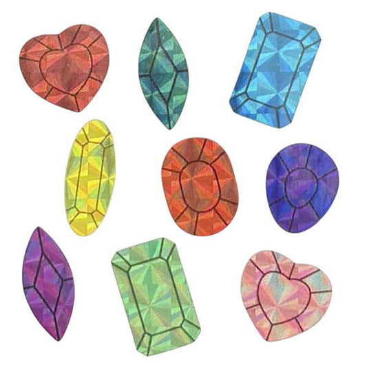 Gros plan sur la planche d'autocollants en forme de pierres précieuses brillantes aux couleurs variées.