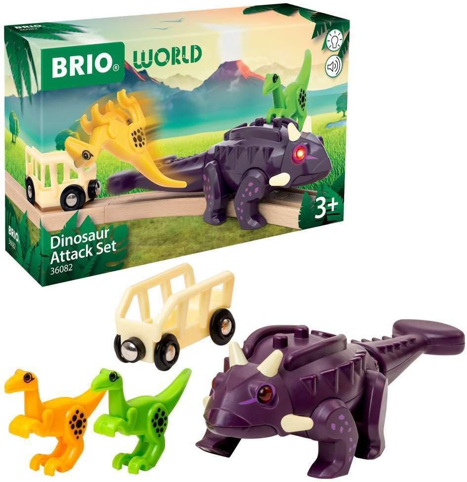 Ensemble Attaque du Dinosaure BRIO World 36082 comprenant un grand dinosaure violet sonorisé et lumineux, deux petits dinosaures et un wagon cage.
