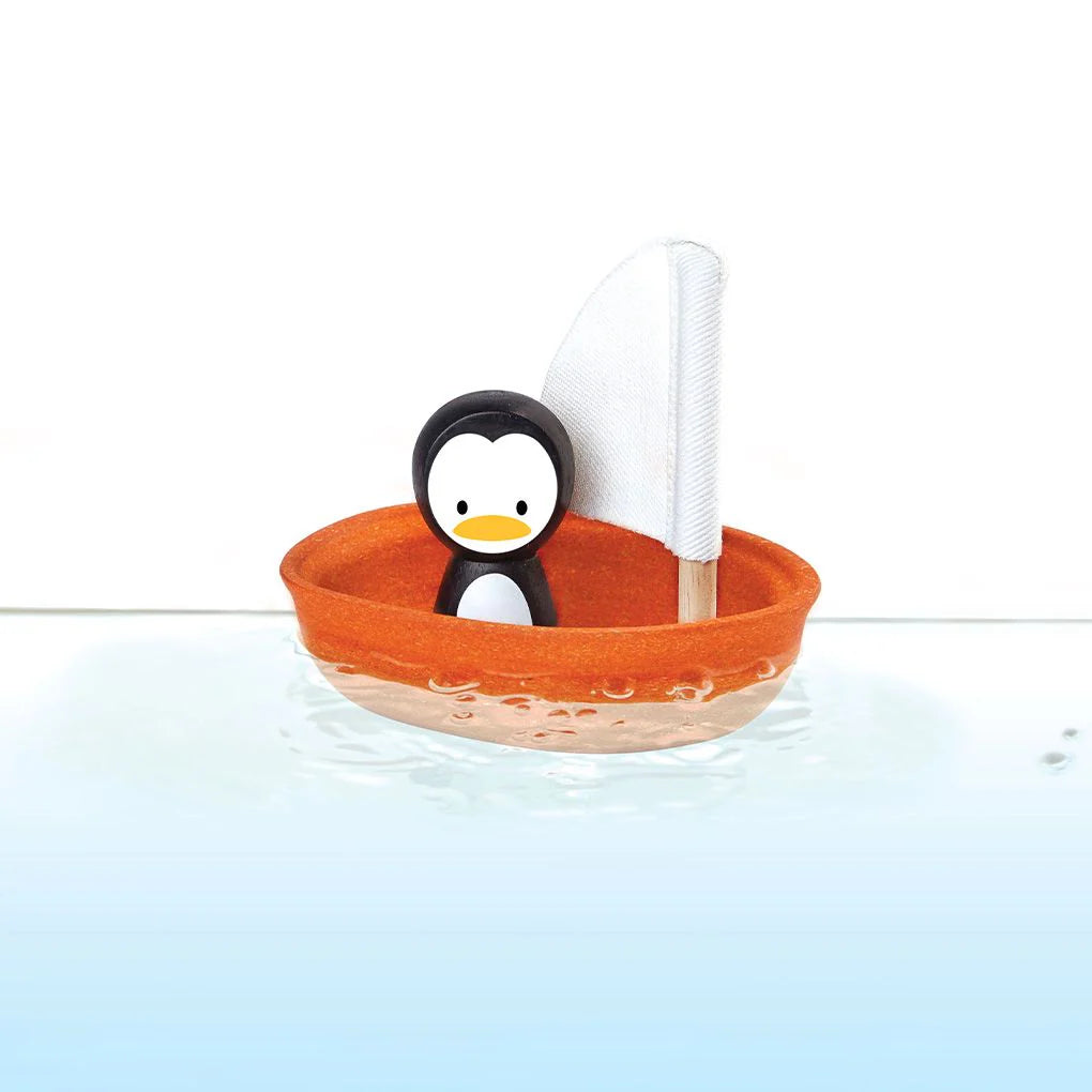 VOILIER EN BOIS AVEC PINGOUIN POUR LE BAIN