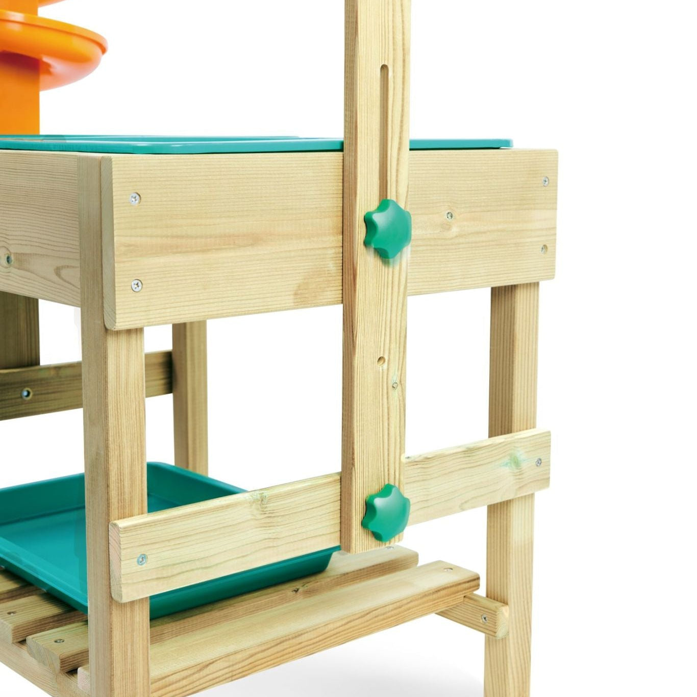 Zoom sur les boutons de réglage verts en plastique installés sur le côté de la structure en bois de la table d'activité Hape, montrant le système pour ajuster la hauteur du niveau supérieur.