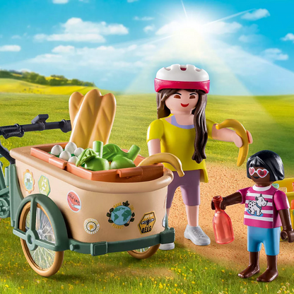 CYCLIST WITH FRONT "COUNTRY" BIKE TRAILER 