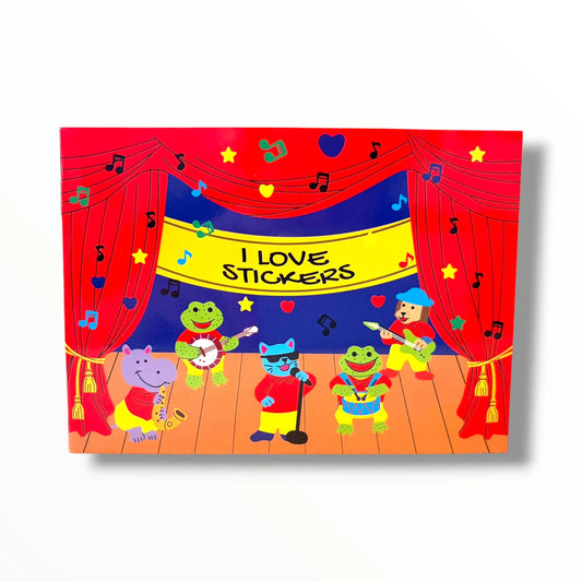 Couverture de l'album d'autocollants I Love Stickers de My Sticker Garden illustrant des animaux musiciens sur scène.