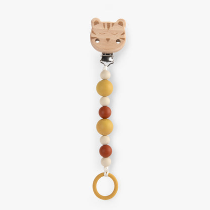 Attache-tétine en bois et silicone Moulin Roty avec clip tête de tigre et perles aux tons d'automne, collection La Forêt du Mawa.