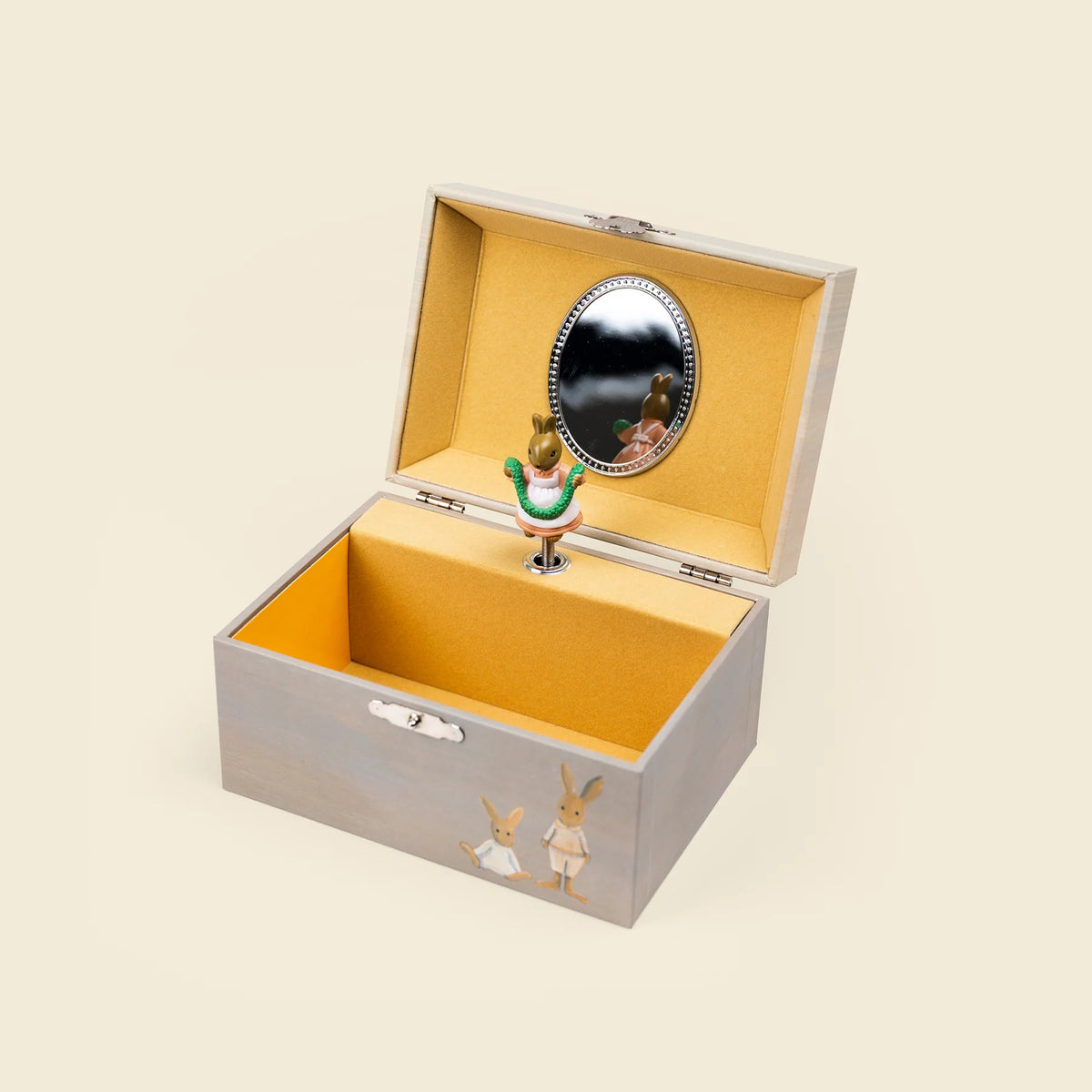 Boîte à musique à bijoux en bois ouverte avec figurine de lapin tenant une guirlande Egmont Toys.