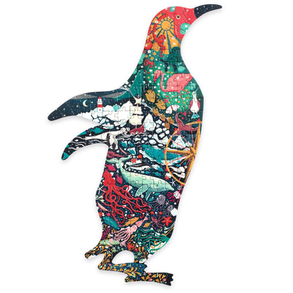 Casse-tête de silhouette Puzz'Art Penguin 150 pièces de Djeco assemblé, illustré de baleines, pieuvres, phares et animaux marins.