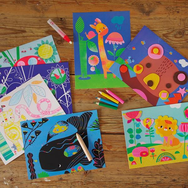 Ensemble des réalisations artistiques du coffret multi-activités Djeco comprenant un ours, un lion, une girafe et une baleine.