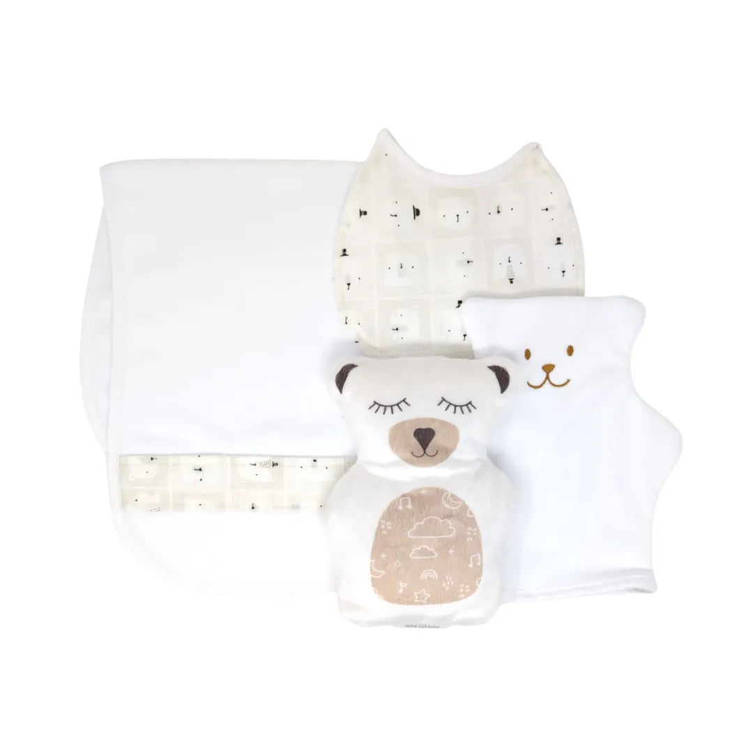 Coffret cadeau de naissance Samy par Béké Bobo comprenant un ourson thérapeutique, un bavoir, une doudou et une débarbouillette aux tons neutres.