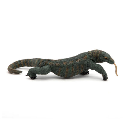 Figurine du Dragon de Komodo Papo vue de profil, langue sortie sur fond blanc.