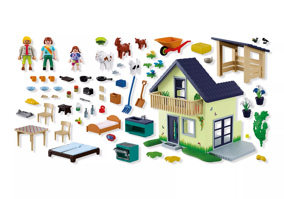 Vue d'ensemble du coffret Playmobil Country 72162 avec la maison de ferme, les personnages, animaux, abri et nombreux accessoires.