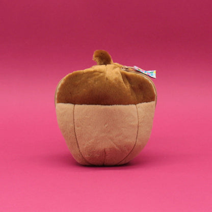 Peluche réversible 2 en 1 Flipetz Les Déglingos refermée sous la forme d'un gland de chêne brun.