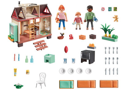 Ensemble complet de 160 pièces du coffret Tiny House Playmobil comprenant 3 personnages, le mobilier et les accessoires.