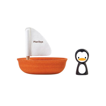 VOILIER EN BOIS AVEC PINGOUIN POUR LE BAIN