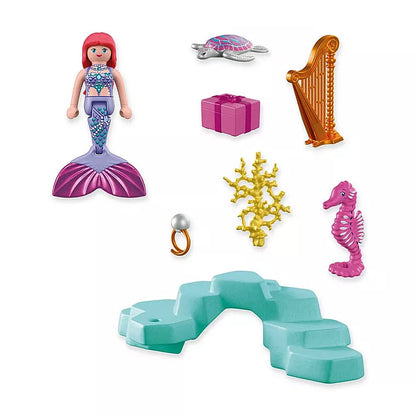 Ensemble des éléments du set Playmobil 72107 : sirène, harpe dorée, tortue marine, hippocampe rose, boîte-cadeau, bague et récif.