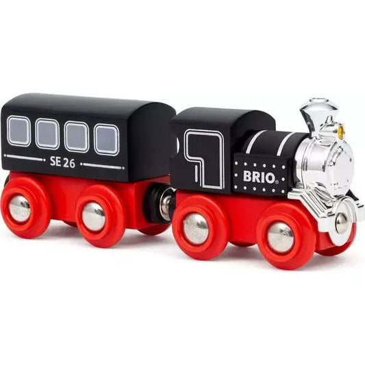 Train en bois édition spéciale BRIO 36140 noir et rouge avec locomotive à détails chromés et wagon de voyageurs.