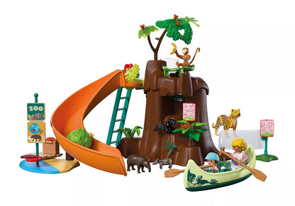 Décors du jeu Playmobil 72071 Zoo au cœur de la jungle avec glissade, canot et animaux exotiques.